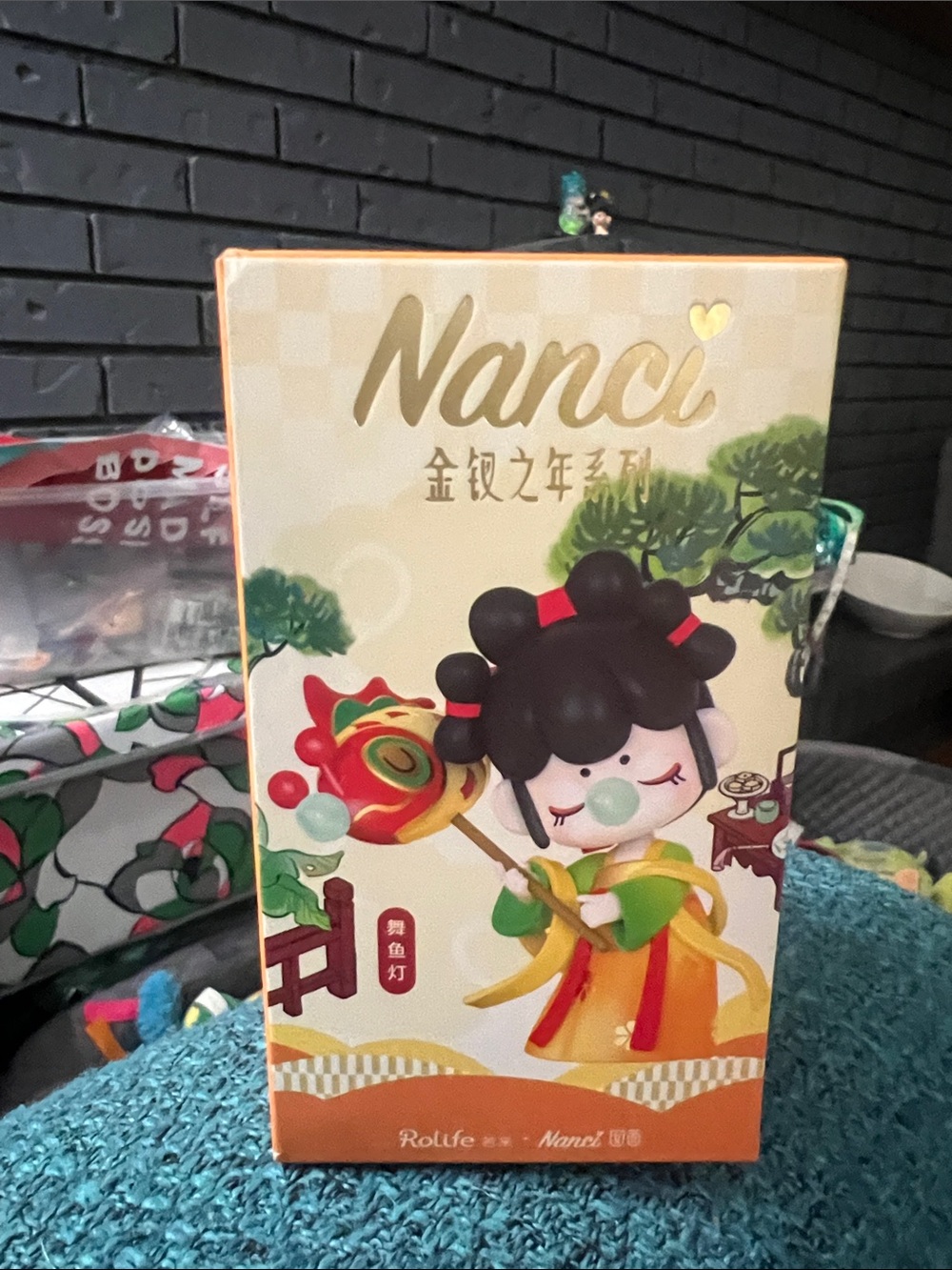 Nanci Collectible Figurine  - Cream & Orange